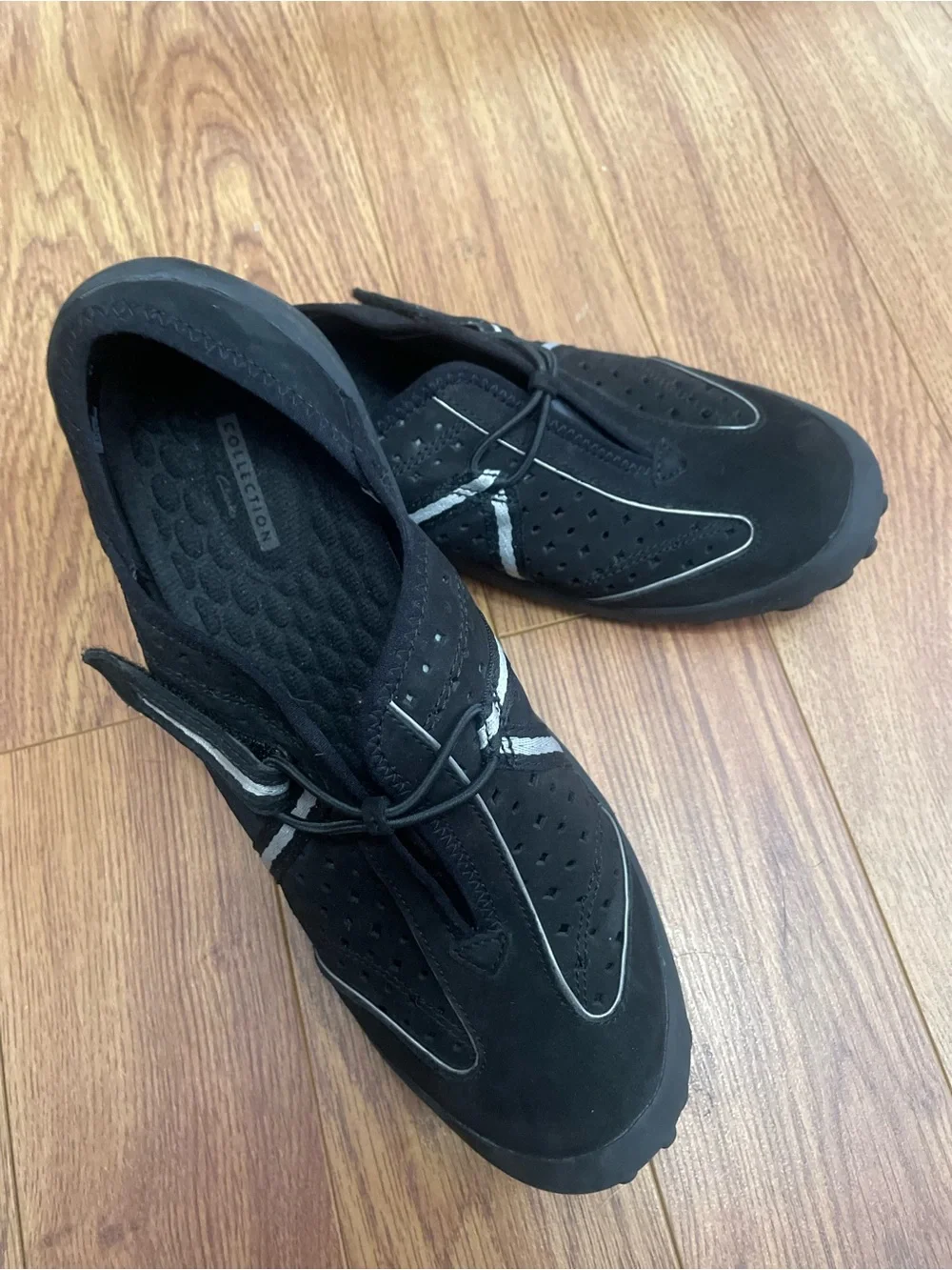 Clarks Women’s Privo Tequini Black Slip-On Perforated Comfort. Suede uppers